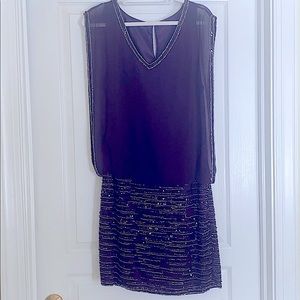 Women’s eggplant sequined dress in size 12.